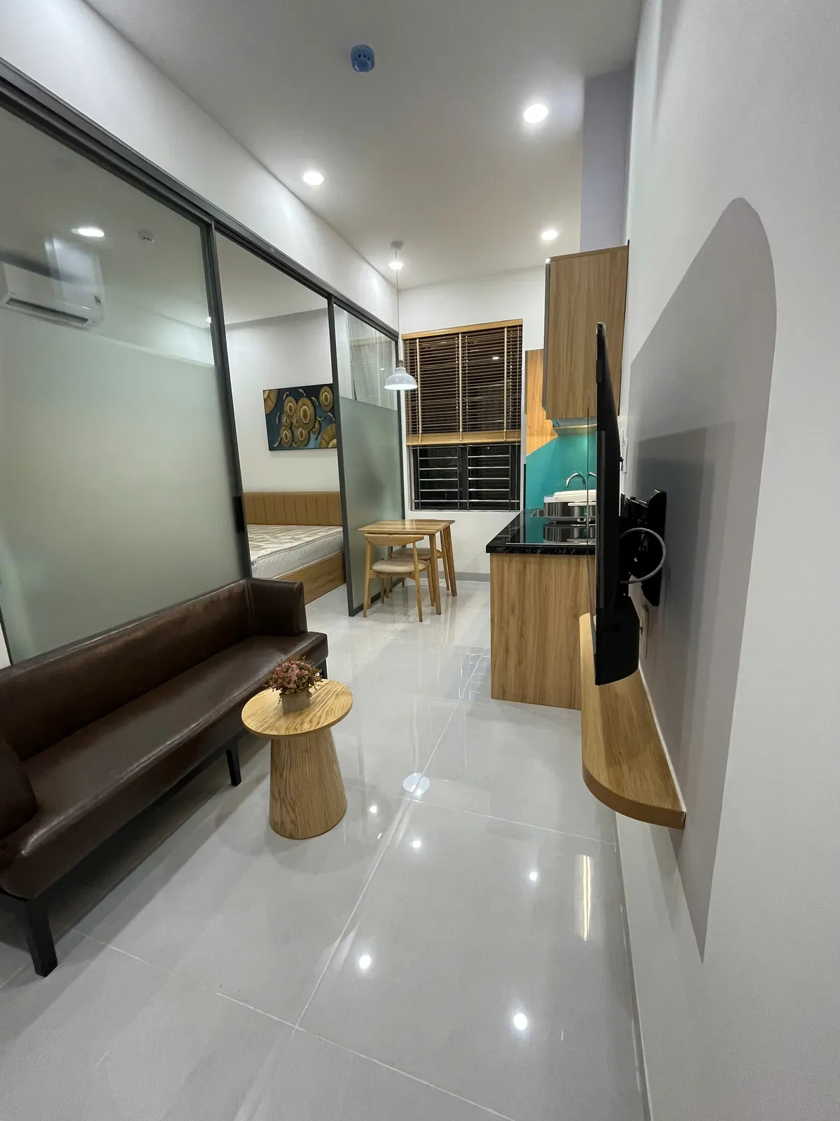 Căn hộ studio — điểm nhấn xanh lá & vòm cong — 5